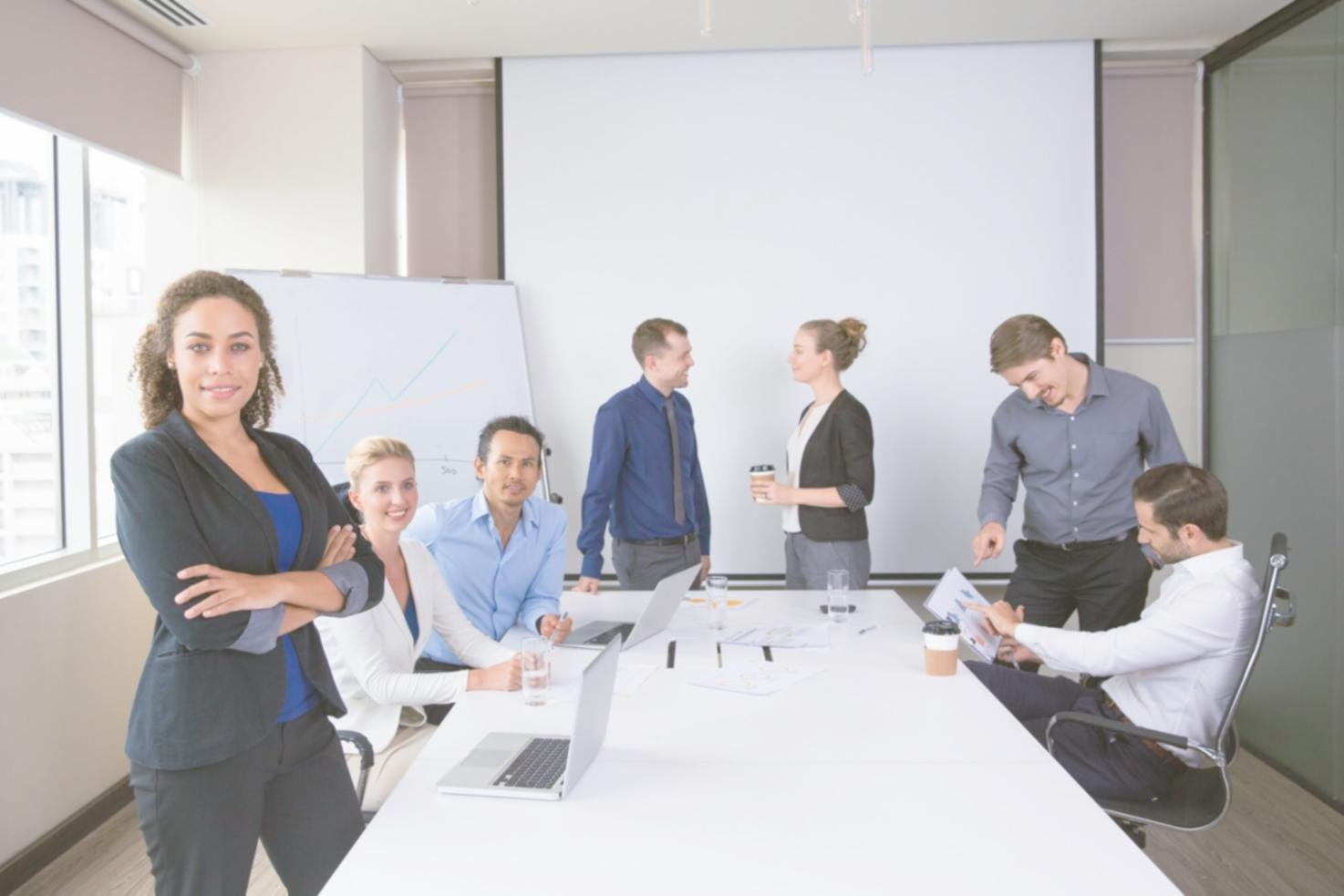 Business professionals reviewing financial strategies in modern office environment